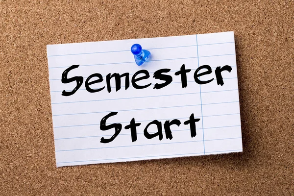 Semester Start - teared note paper pinned on bulletin board