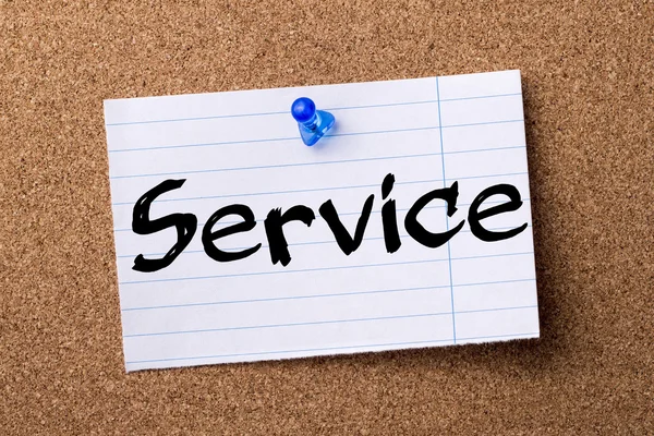 Service - teared note paper pinned on bulletin board — Stock Photo, Image