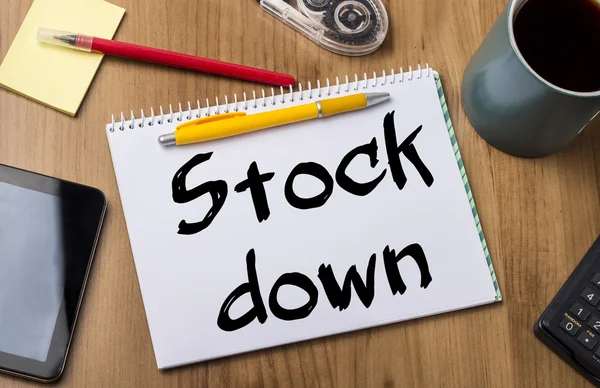 Stock down - Almofada de notas com texto — Fotografia de Stock