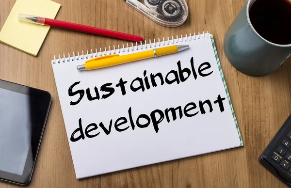 Desenvolvimento sustentável - Almofada de notas com texto — Fotografia de Stock