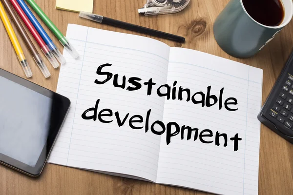 Desenvolvimento sustentável - Almofada de notas com texto — Fotografia de Stock