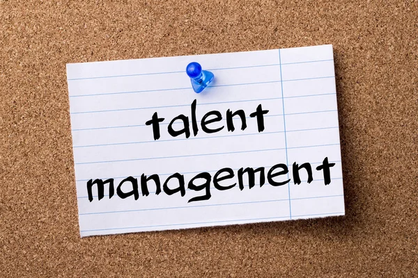 Talent management - teared note paper pinned on bulletin board — Stock Photo, Image