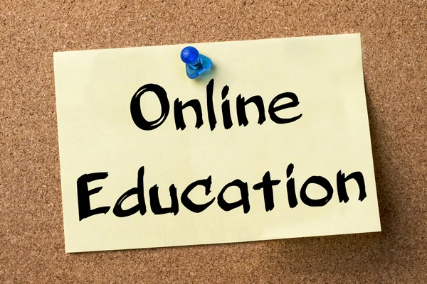 Online Education - adhesive label pinned on bulletin board