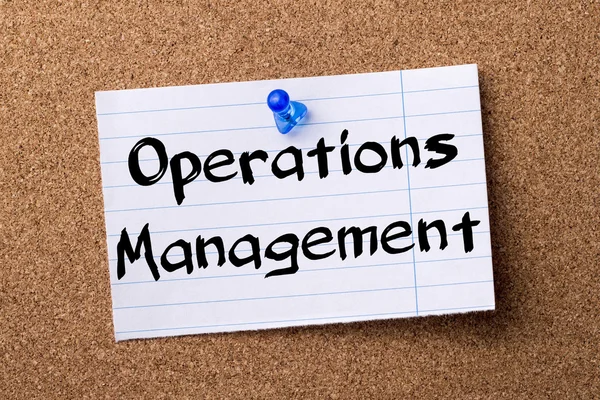 Operations Management - teared note paper pinned on bulletin boa — Stock Photo, Image