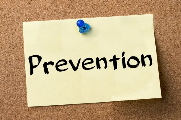 Prevention - adhesive label pinned on bulletin board — Stock Photo, Image