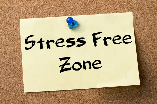 Stress Free Zone - adhesive label pinned on bulletin board — Stock Photo, Image