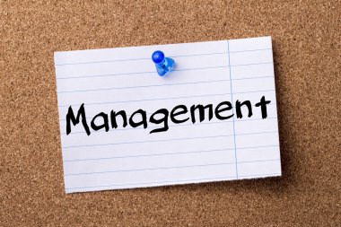 Yönetim - kalçası not kağıdı bulletin board tutturulmuş.