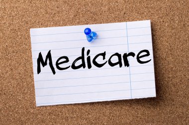 Medicare - kalçası not kağıdı bulletin board tutturulmuş.