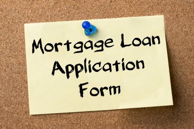Mortgage kredi başvuru formu - yapışkanlı etiket üzerinde kurşun tutturulmuş.