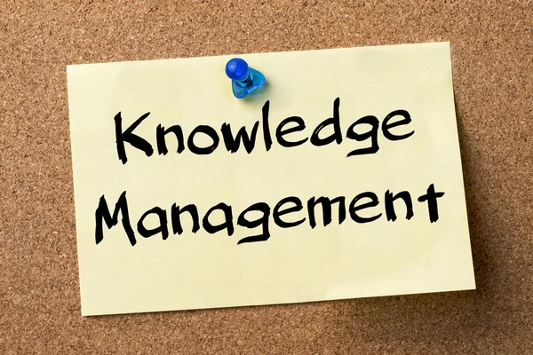 Knowledge Management - adhesive label pinned on bulletin board