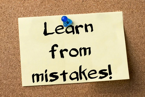 Learn from mistakes! - adhesive label pinned on bulletin board — Stock Photo, Image