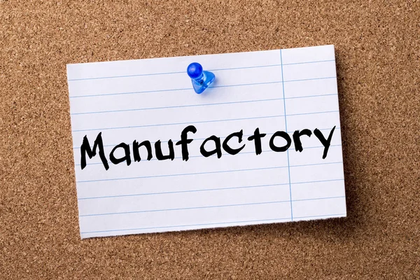 Manufactory - teared note paper pinned on bulletin board — Stock Photo, Image