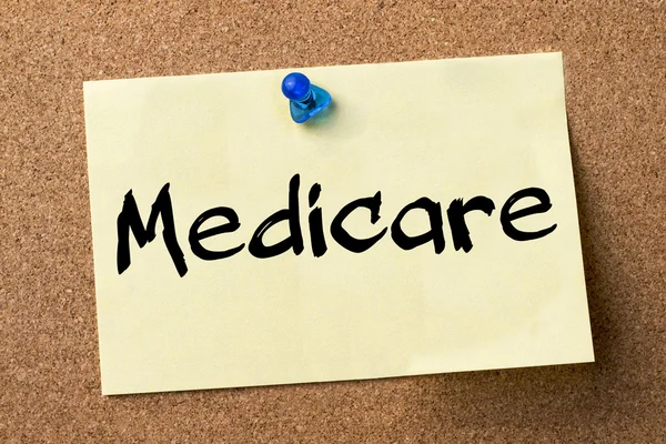 Medicare - yapışkanlı etiket bulletin board tutturulmuş.