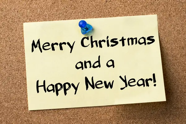 Merry Christmas and a Happy New Year! - adhesive label pinned on — Stock Photo, Image