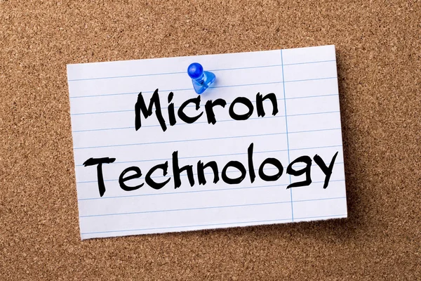 Micron Technology - teared note paper pinned on bulletin board
