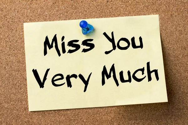 Miss You Very Much - adhesive label pinned on bulletin board — Stock Photo, Image