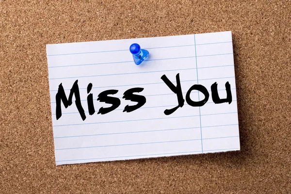 Miss You - teared note paper pinned on bulletin board — Stock Photo, Image