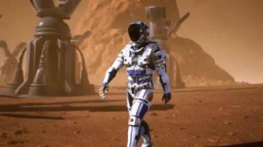 Astronot Mars yüzeyine çıkar. 