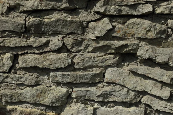 Фон из серых камней. Стена из прямоугольных серых камней — стоковое фото