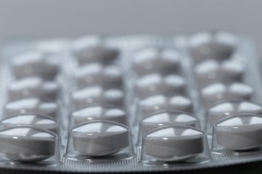 Ağrı kesici tablet kapatın