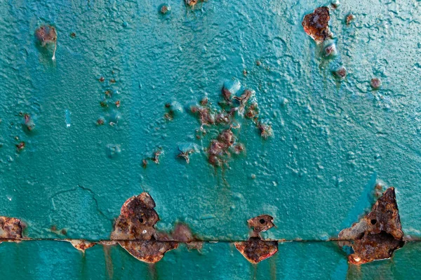 Bubbles in paint work as rust works on the metal underneath