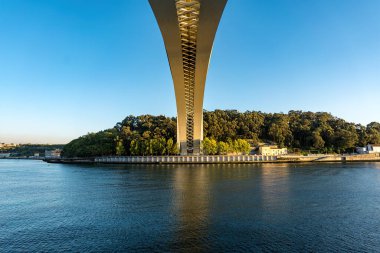 Ponte Arrabida crossing Douro River in Portugal clipart