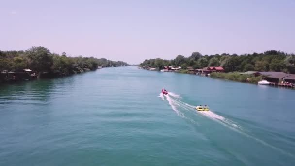 Jet Boat Pulling Two People River — Stock Video