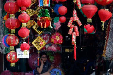 Chinese new year. Red paper lanterns for sale.  Ho Chi Minh City. Vietnam. clipart