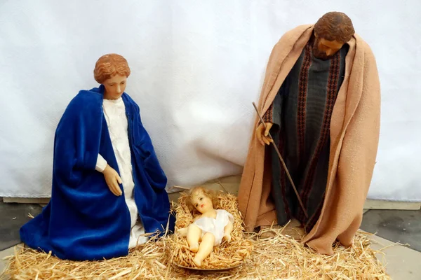 Nativity scene. Christmas crib.  Holy family with baby Jesus.  Catholic church.  France.