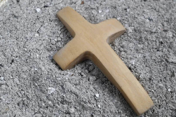 Cross with ashes. Ash Wednesday. Lent season. France.