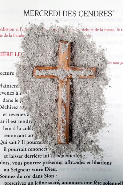Catholic mass. Ash wednesday celebration. Ashes and lectionary.  Lent season.  Catholic church.  France.