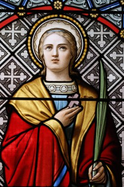 Varsayım kilisesi. Lekeli cam. Antakyalı Margaret. (Büyük Şehit Aziz Marina) Lessard en Bresse 'de. Fransa.