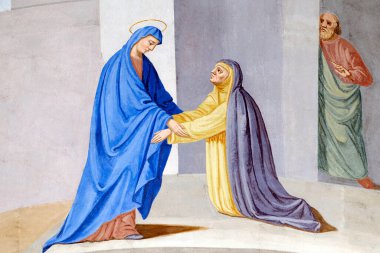 Aziz Jean Baptiste Kilisesi. F Mucengo 'nun duvar resmi. Bakire Meryem 'in ziyareti, İncil' de yazdığı gibi Elizabeth 'le birlikte Meryem' in ziyaretidir. Melife. Fransa..