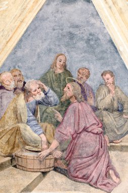 Aziz Jean Baptiste Kilisesi. - Tanrım! Ayakların yıkanması. F Mucengo 'nun duvar resmi. Melife. Fransa..