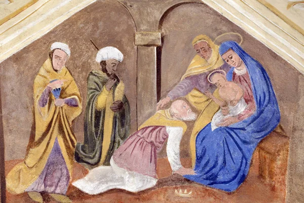 Aziz Jean Baptiste Kilisesi. İsa 'nın doğumu ya da İsa' nın doğumu. Üç bilge adam ya da büyücü tarafından Çocuk İsa 'ya tapma. F Mucengo 'nun duvar resmi. Melife. Fransa..