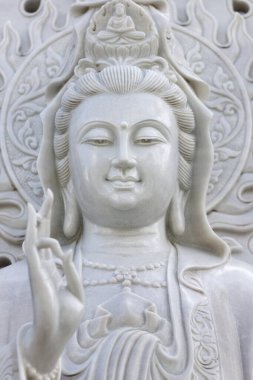 Budist tapınağı. Quan Am (Quanyin) merhamet tanrıçası ya da merhamet tanrıçası. Mermer heykel. Kontum. Vietnam.