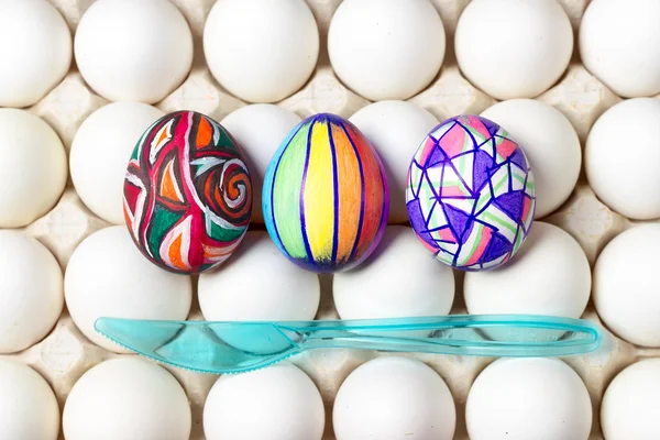 Multicolored painted easter eggs on white tray, food photography — Stock Photo, Image