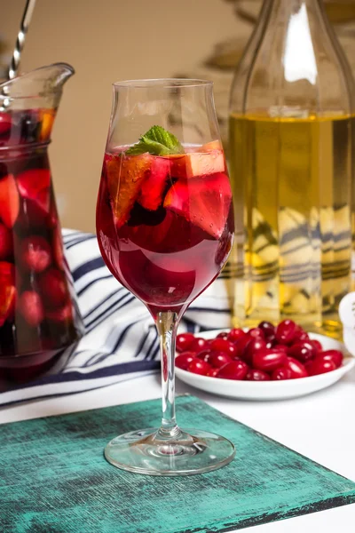 Summer home wine with fruits, sangria cocktail, dogwood berries plate — Stock Photo, Image