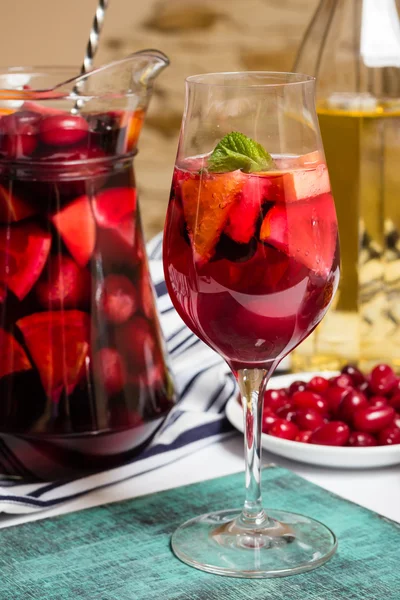 Summer home wine with fruits, sangria cocktail, dogwood berries plate — Stock Photo, Image