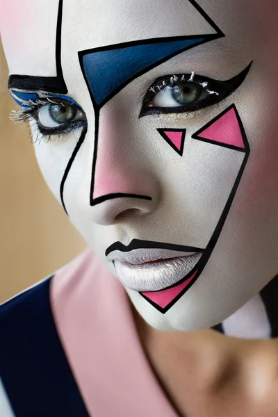 Closeup portret, mooi meisje model met creatieve grafische gezicht kunst Rechtenvrije Stockfoto's