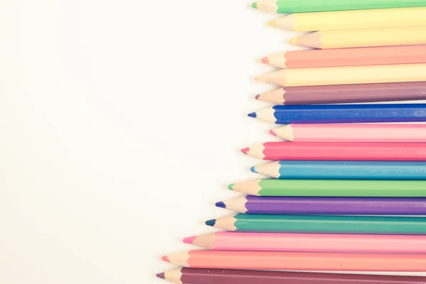Colorful pencils in vintage filter tone — Stock Photo, Image