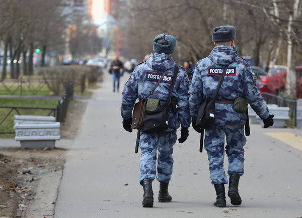 Two Russian guardsmen on a public order patrol, Iskrovsky Prospekt, Saint Petersburg, Russia, April 2021