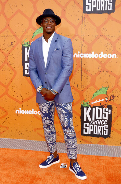 спортсмен Кэм Ньютон
