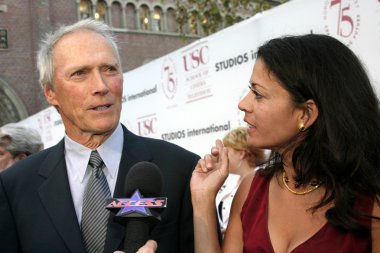 Clint Eastwood and Dina Ruiz clipart