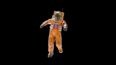 Astronot rahat bir şekilde havada asılı duruyor.