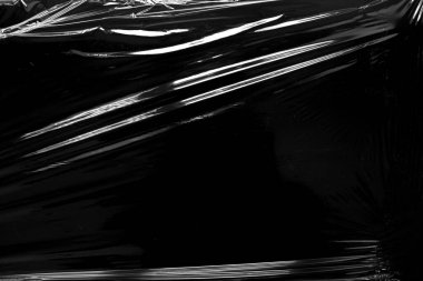 Siyah Arkaplan ile Plastik Paket Dokusu