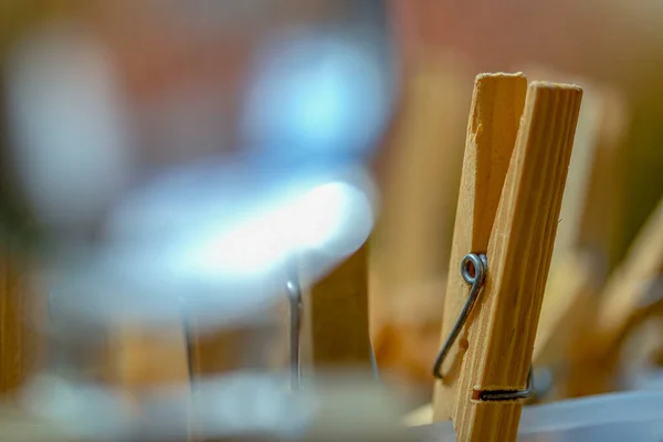 stock image Macro photography of a wooden drying clip through a crystal ball.