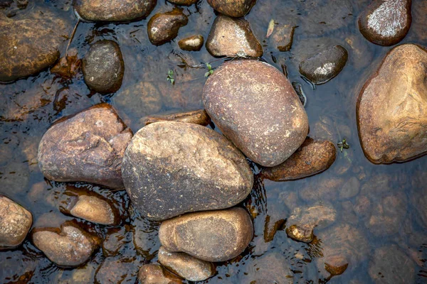 Top view photography of  river rocks captured at the El Valle river in the south of the department of Santander in Colombia