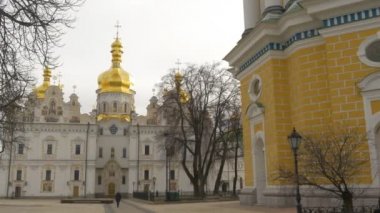 Yellow Painted Wall of Bell Tower Dormition Cathedral With Golden Cupolas Holy Dormition Kiev-Pechersk Lavra Architecture of an Orthodox Churches Ukraine