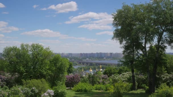 Spring Landscape Domes Of Vydubychi Monastery White Clouds Railway Bridge Across The Dnieper Multi-storey Houses On THe Left Bank Of The Dnieper Kiev — Stock Video
